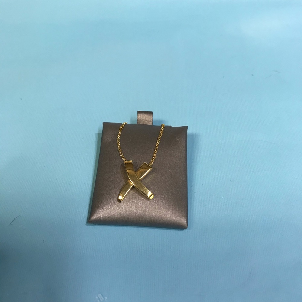 Authentic Tiffany & Co. Kiss Pendant